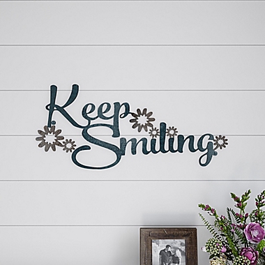 21.75-Inch x 10-Inch &quot;Keep Smiling&quot; Iron Wall Art. View a larger version of this product image.