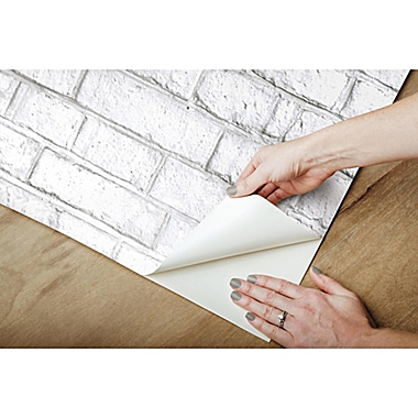 RoomMates&reg; Brick Peel &amp; Stick Wallpaper in White. View a larger version of this product image.
