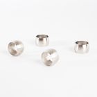 Alternate image 1 for Saro Lifestyle Round Shape Hammered Napkin Rings in Silver (Set of 4)