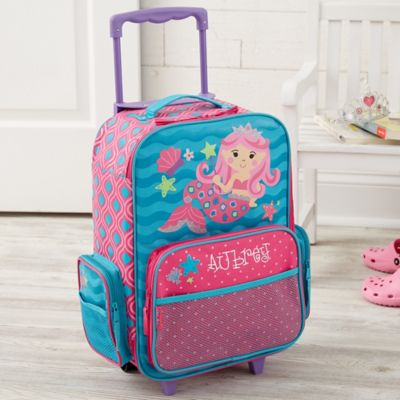 pink rolling luggage