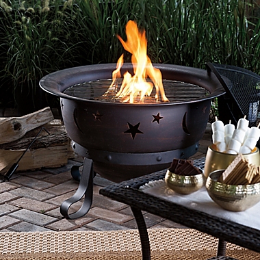 UniFlame&reg; Stars and Moons Outdoor Wood Burning Fire Pit. View a larger version of this product image.