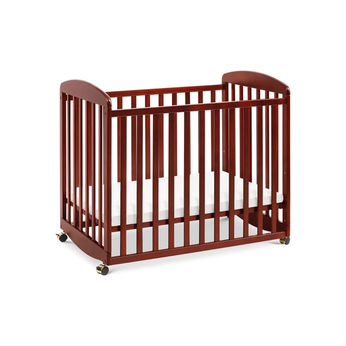 Davinci Alpha Mini Rocking Crib In Cherry Bed Bath Beyond