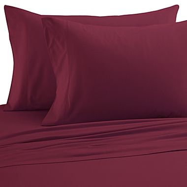 Micro Flannel&reg; Solid Twin XL Sheet Set in Wine. View a larger version of this product image.