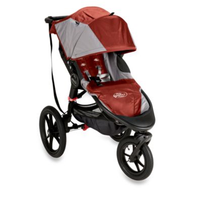 orange jogging stroller