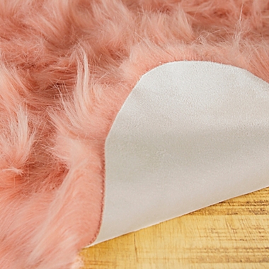 Luxe Faux Fur&trade; Gordon Faux Sheepskin 2&#39; x 3&#39; Accent Rug in Dusty Rose. View a larger version of this product image.
