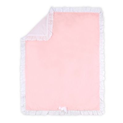 pink and white baby blanket