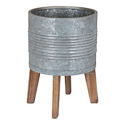 Kate and Laurel® Gavri Planter with Stand in Grey/Brown