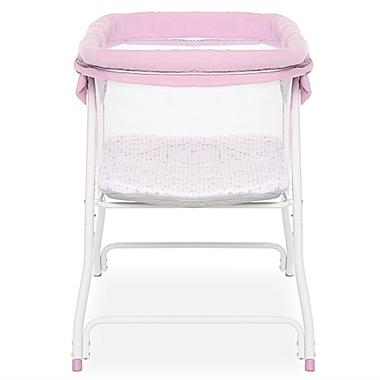 Dream On Me Poppy Portable Bassinet in Pink/Purple. View a larger version of this product image.