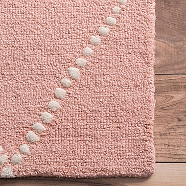 nuLOOM Elvia 5&#39; x 8&#39; Area Rug in Baby Pink. View a larger version of this product image.