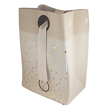 Bee &amp; Coco Round Collapsible Hamper in Ivory with Gold Metallic Polka Dots. View a larger version of this product image.