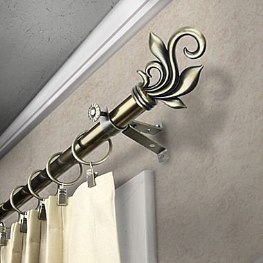 Rod Desyne Delilah 28 to 48-Inch Single Drapery Rod with Finials in Antique Brass. View a larger version of this product image.