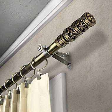 Rod Desyne Whirl 28 to 48-Inch Single Drapery Rod with Finials in Antique Brass. View a larger version of this product image.