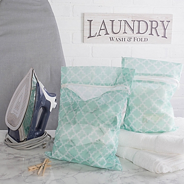 Design Imports 5-Piece Mesh Laundry Bag G Set in Aqua Lattice. View a larger version of this product image.