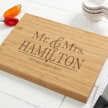 The Wedding Couple Personalized Bamboo Cutting Board. View a larger version of this product image.