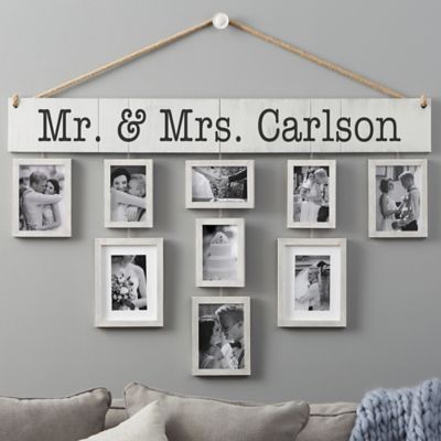 hanging framed photos on a wall