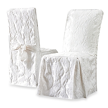 Sure Fit&reg; Matelasse Damask Long Dining Chair Cover in White. View a larger version of this product image.