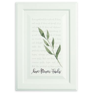 "Love Never Fails" 10.5-Inch x 15-Inch Wood Wall Art. View a larger version of this product image.