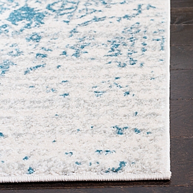 Safavieh Madison 2&#39;3 x 6&#39; Arya Runner in Teal. View a larger version of this product image.
