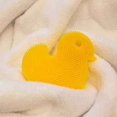Innobaby&reg; Duck Bath Scrub in Yellow. View a larger version of this product image.