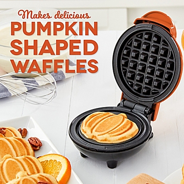DASH&trade; Pumpkin Mini Waffle Maker in Orange. View a larger version of this product image.