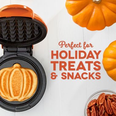 DASH&trade; Pumpkin Mini Waffle Maker in Orange. View a larger version of this product image.
