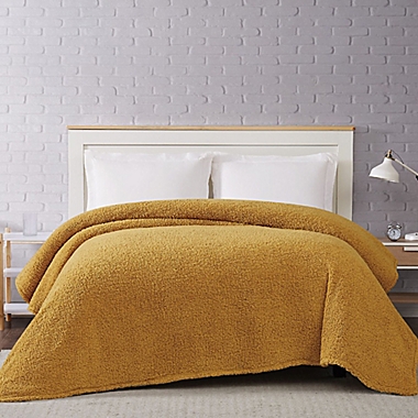 Brooklyn Loom Marshmallow Sherpa Full/Queen Throw Blanket in Mustard. View a larger version of this product image.