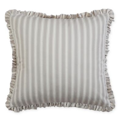 grey and beige decorative pillows