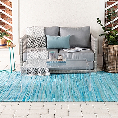 Unique Loom Chindi Stripe 9&#39; x 12&#39; Braided Area Rug in Turquoise. View a larger version of this product image.