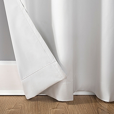 Sun Zero&reg; Duran 63-Inch Grommet 100% Blackout Window Curtain Panel in White (Single). View a larger version of this product image.