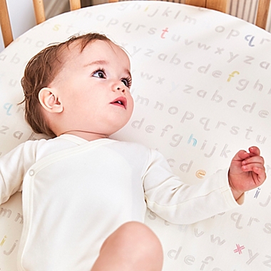 Stokke&reg; Sleepi&trade; Petite Pehr Mini Fitted Crib Sheet in Rainbow Alphabet. View a larger version of this product image.