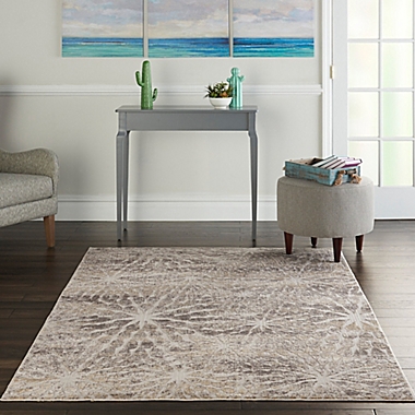 Nourison Sleek Textures Abstract Floral 3&#39;11 x 5&#39;11 Area Rug in Ivory/Beige. View a larger version of this product image.