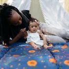 Alternate image 4 for Little Unicorn&reg; Midnight Poppy Outdoor Blanket in Blue/Red