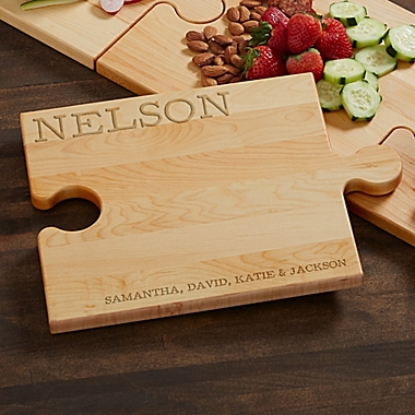 Family Connection Personalized Puzzle Piece Cutting Board. View a larger version of this product image.