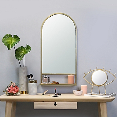 Stratton Home D&eacute;cor Madeline Accent Mirror with Collapsible Shelf in Gold. View a larger version of this product image.