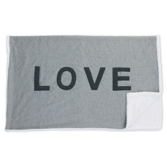 Thro "LOVE" Reversible Jersey Knit Throw Blanket in Charcoal Grey Bed