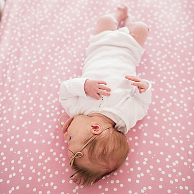 Copper Pearl&trade; Lucy Premium Fitted Crib Sheet in Pink. View a larger version of this product image.