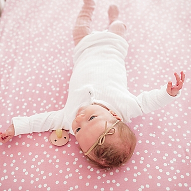 Copper Pearl&trade; Lucy Premium Fitted Crib Sheet in Pink. View a larger version of this product image.
