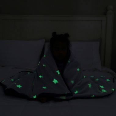 Therapedic&reg; Glow-in-the-Dark Reversible 6 lb. Weighted Throw Blanket in Grey. View a larger version of this product image.