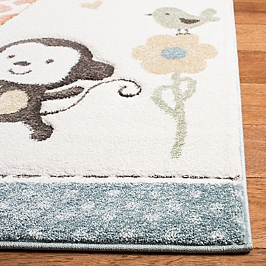 Safavieh Carousel Kids Animals Area Rug in Ivory. View a larger version of this product image.