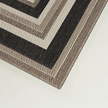 Destination Summer Miami Border Indoor/Outdoor Rug in Brown/Tan. View a larger version of this product image.