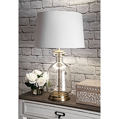 nuLOOM Emma Clear Glass Table Lamp with Cotton Shade in Ivory. View a larger version of this product image.