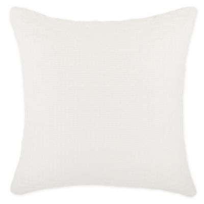 cream and white pillows