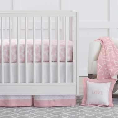 Just Born&reg; Dream Crib Bedding Collection in Pink/White. View a larger version of this product image.