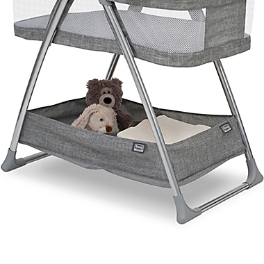 Simmons Kids City Sleeper Trendy Bassinet in Grey with Electronic Mobile by Delta Children. View a larger version of this product image.