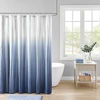 Madison Park Ara Ombre Printed Seersucker Shower Curtain in Blue. View a larger version of this product image.