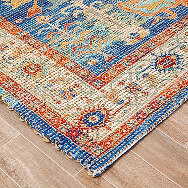 Sahand Distressed Rug in Blue/Burnt Orange. View a larger version of this product image.