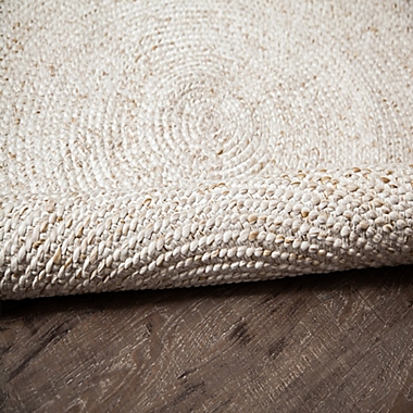 Hummingbird Handcrafted Area Rug in Ivory/Tan. View a larger version of this product image.