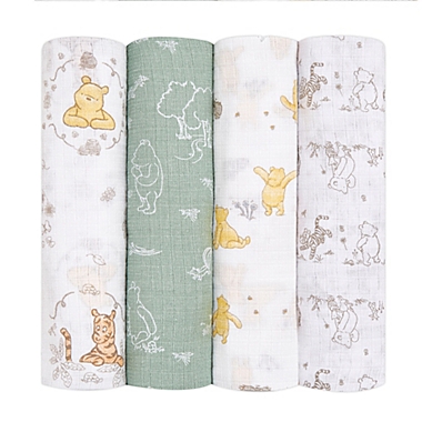 aden + anais essentials&trade; Disney&reg; 4-Pack Winnie the Pooh Swaddle Blankets in White/Green. View a larger version of this product image.