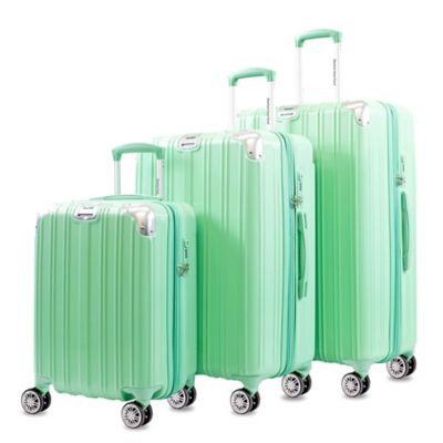 green hardside luggage