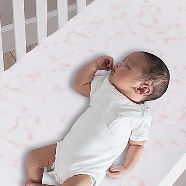 Lambs &amp; Ivy&reg; Signature Separates Marble Fitted Crib Sheet in Pink. View a larger version of this product image.